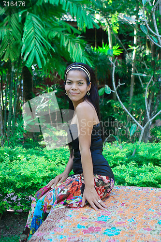 Image of Happy Asian woman.