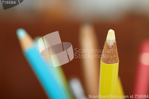 Image of Education - sharpened colourful pencil with copy space