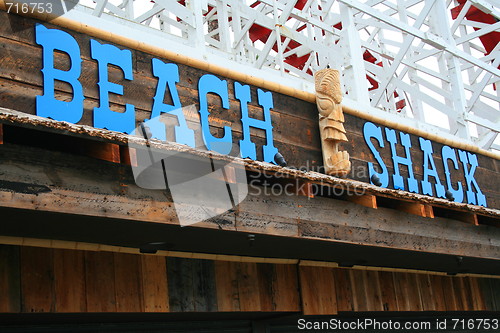 Image of Beach Shack Sign and Totem Pole