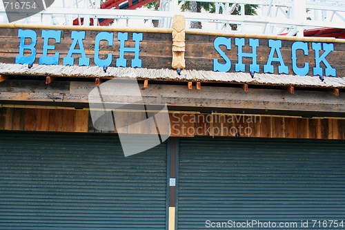 Image of Beach Shack Sign and Totem Pole