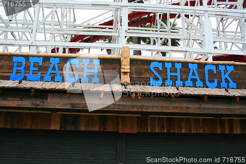 Image of Beach Shack Sign and Totem Pole