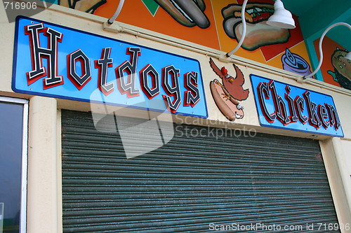 Image of Funny Hot Dogs and Chicken Sign