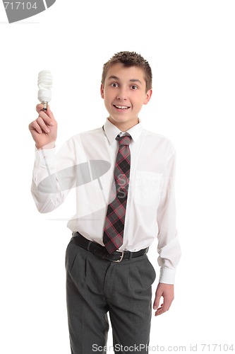 Image of School boy holding a light bulb