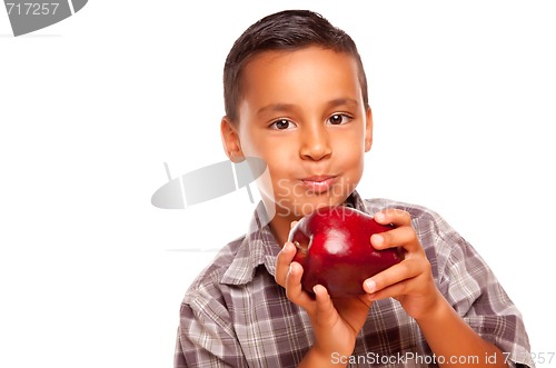 Image of Adorable Hispanic Boy Eating a Large Red Apple