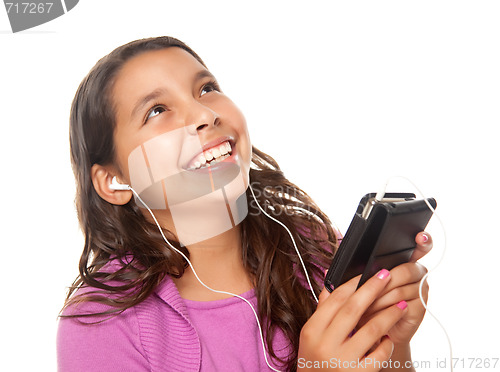 Image of Pretty Hispanic Girl Listening to Music