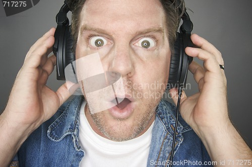 Image of Shocked Man Wearing Headphones