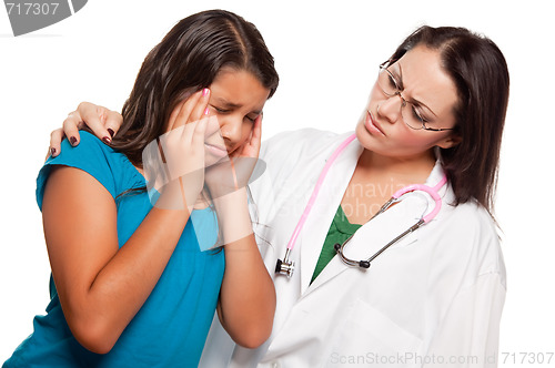 Image of Unhappy Hispanic Girl and Concerned Female Doctor