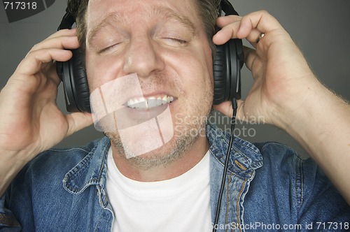 Image of Man Wearing Headphones