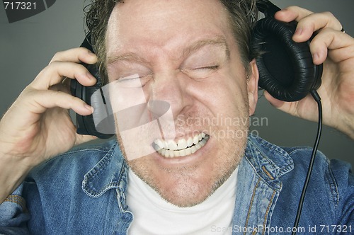 Image of Shocked Man Wearing Headphones
