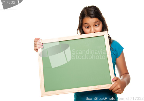 Image of Pretty Hispanic Girl Holding Blank Chalkboard