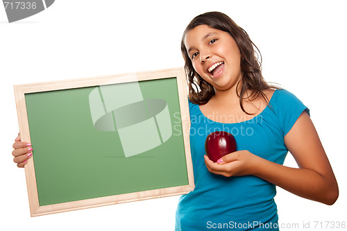 Image of Pretty Hispanic Girl Holding Blank Chalkboard and Apple