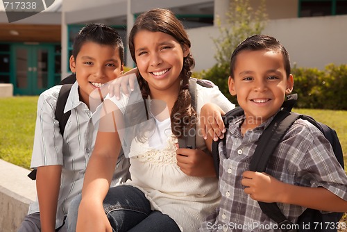 Image of Cute Brothers and Sister Ready for School