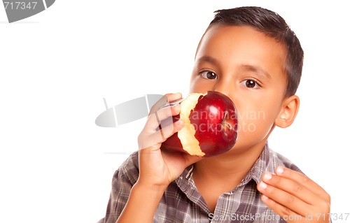 Image of Adorable Hispanic Boy Eating a Large Red Apple