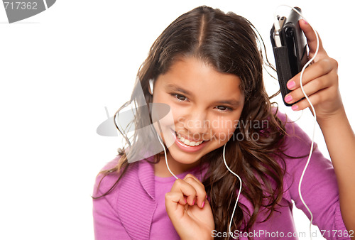 Image of Pretty Hispanic Girl Listening and Dancing to Music