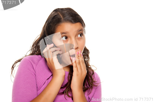 Image of Shocked Pretty Hispanic Girl On Cell Phone