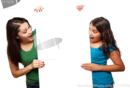 Image of Pretty Hispanic Girl and Mother Holding Blank Board