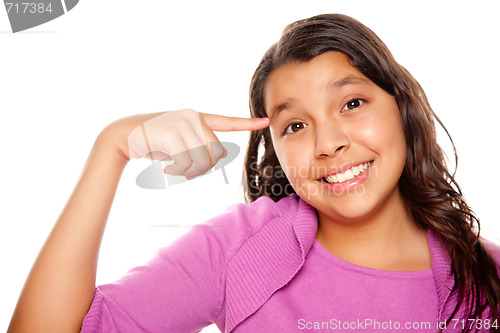 Image of Pretty Hispanic Girl Pointing to Her Head 