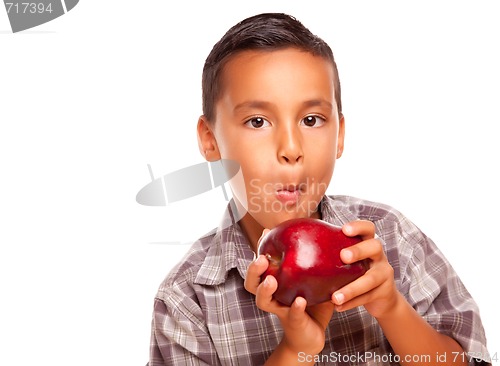 Image of Adorable Hispanic Boy Eating a Large Red Apple