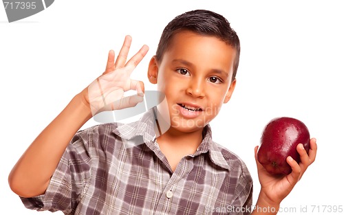 Image of Adorable Hispanic Boy with Apple and Okay Hand Sign