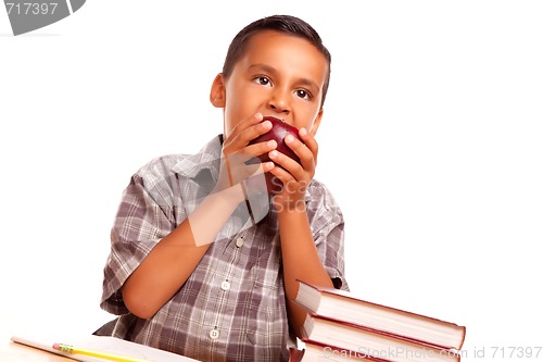 Image of Adorable Hispanic Boy Eating a Large Red Apple