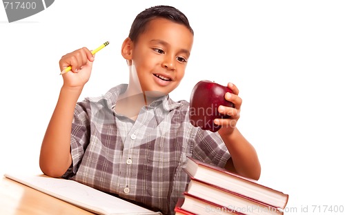 Image of Adorable Hispanic Boy with Books, Apple, Pencil and Paper
