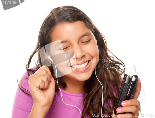 Image of Pretty Hispanic Girl Listening to Music