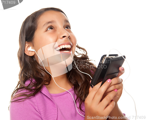 Image of Pretty Hispanic Girl Listening and Dancing to Music