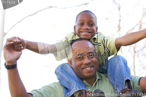 Image of Man and Child Having Fun