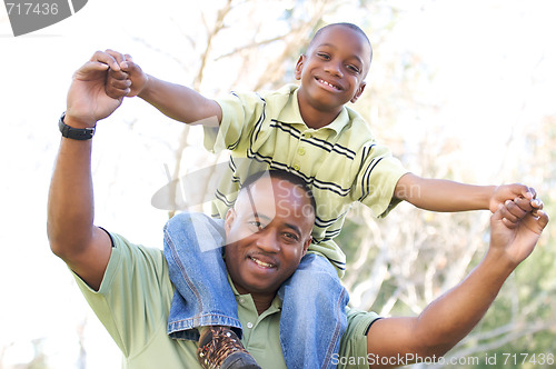 Image of Man and Child Having Fun