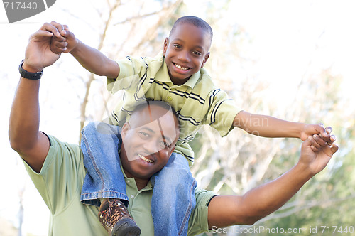 Image of Man and Child Having Fun