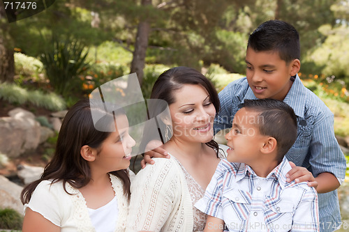 Image of Happy Mother and Children in the Park