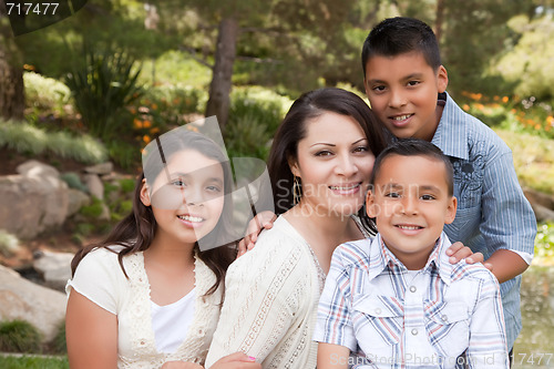 Image of Happy Mother and Children in the Park