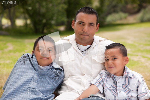 Image of Father and Sons in the Park