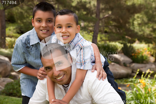 Image of Father and Sons in the Park