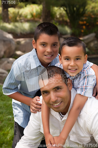 Image of Father and Sons in the Park