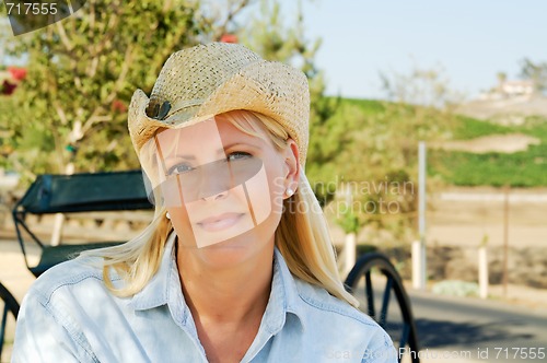 Image of Cute Cowgirl in The Country