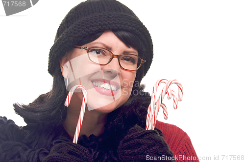 Image of Attractive Woman Holds Candy Canes