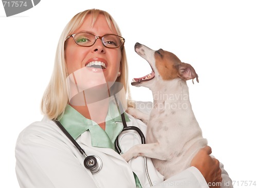 Image of Attractive Female Doctor Veterinarian with Small Puppy