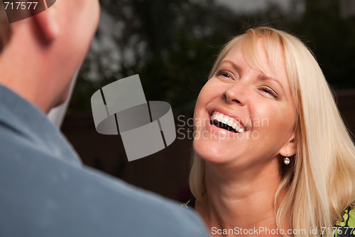 Image of Blonde Woman Socializing with Friend