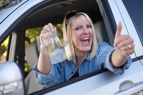 Image of Attractive Woman In New Car with Keys