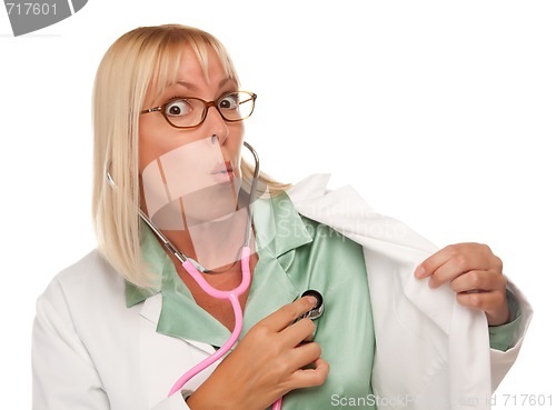 Image of Attractive Female Doctor or Nurse Checking Her Own Heart