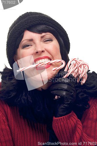 Image of Attractive Woman Holds Candy Canes