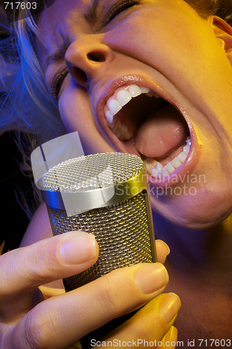 Image of Woman Sings with Passion