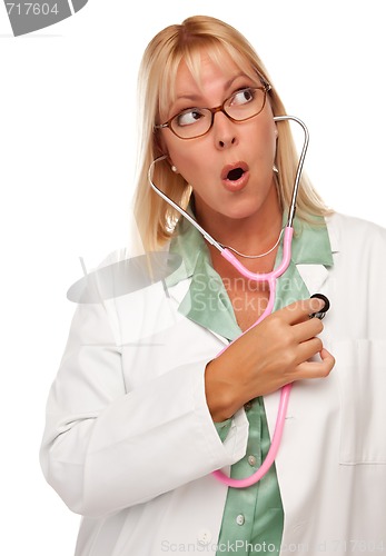 Image of Attractive Female Doctor or Nurse Checking Her Own Heart