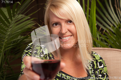 Image of Beautiful Blonde Enjoying Wine