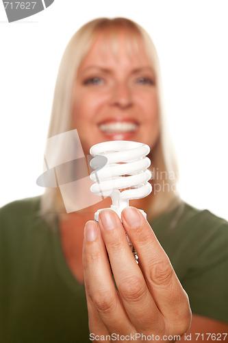 Image of Attractive Blonde Woman Holds Energy Saving Light Bulb