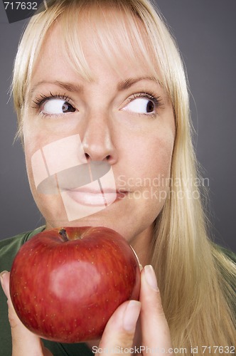 Image of Beautiful Woman With Apple