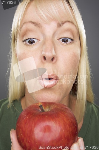 Image of Beautiful Woman With Apple