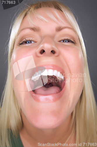 Image of Laughing Blond Woman with Funny Face