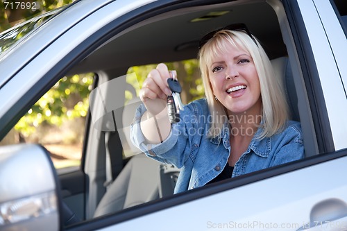 Image of Attractive Woman In New Car with Keys